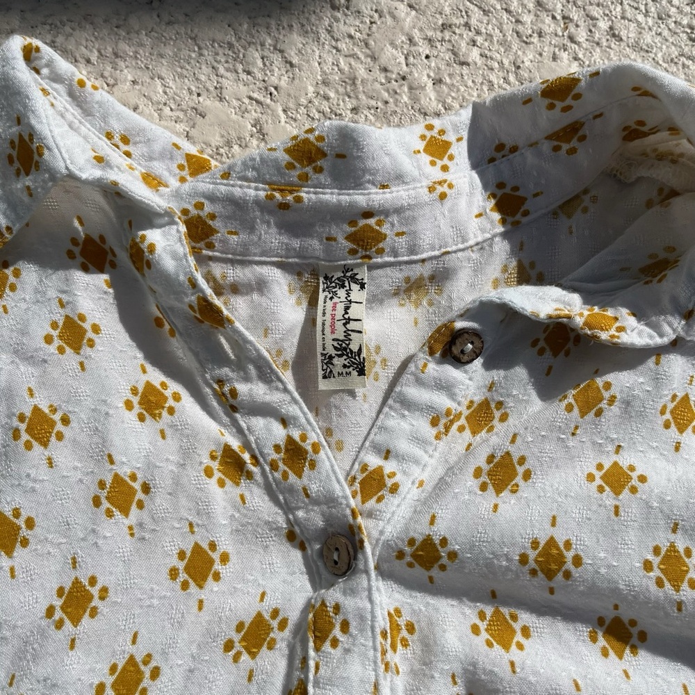 Free people white and yellow one piece